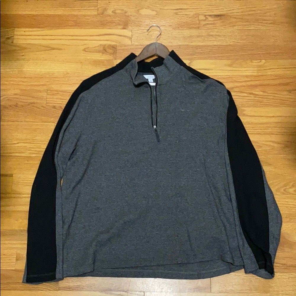 A Calvin Klein gray and black sweatshirt